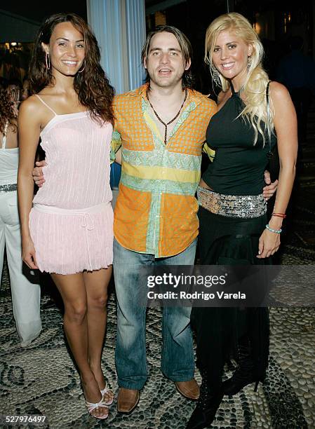 Jessica Mas, Alejandro Montaner and Barbie Simons during A&E Mundo and The History Channel Party at Casa Casuarina in Miami Beach, Florida, United...