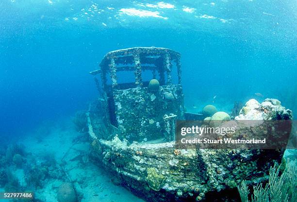 sunken tug in caracas bay - ship wreck stock pictures, royalty-free photos & images