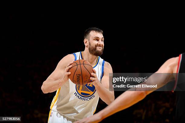Andrew Bogut of the Golden State Warriors handles the ball during the game against the Portland Trail Blazers in Game Two of the Western Conference...