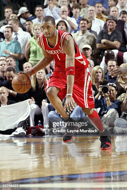 Tracy McGrady of the Houston Rockets moves the ball in Game five of the Western Conference Quarterfinals with the Dallas Mavericks during the 2005...