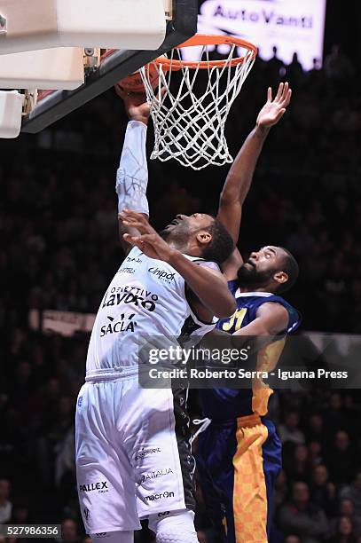 Dexter Pittman of Obiettivo Lavoro competes with Christian Eyenga of Manital during the LegaBasket match between Virtus Obiettivo Lavoro Bologna v...