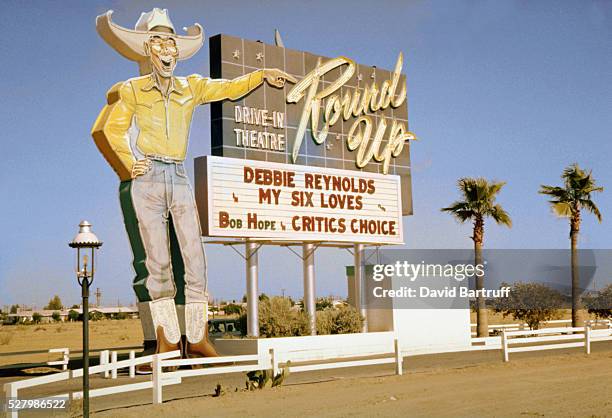 The marquee for the Round Up Drive-in-Theatre lists My Six Loves, starring Debbie Reynolds, Phoenix, Arizona, ca. 1964.