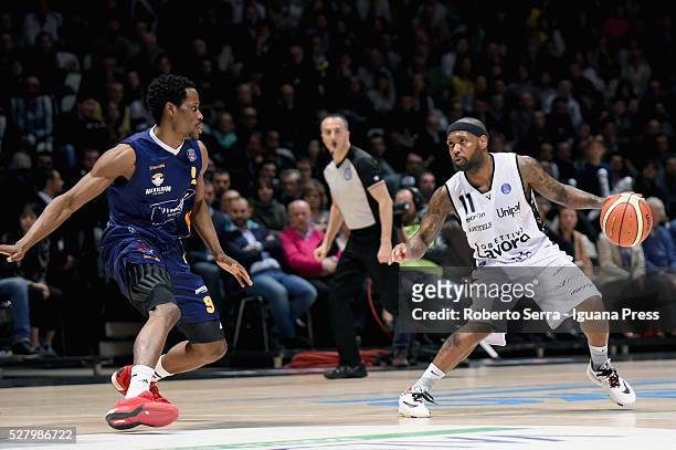 Andre Collins of Obiettivo Lavoro competes with Charlon Kloof of Manital during the LegaBasket match between Virtus Obiettivo Lavoro Bologna v...
