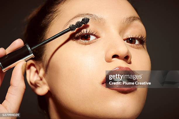 luxury beauty - applying makeup stockfoto's en -beelden