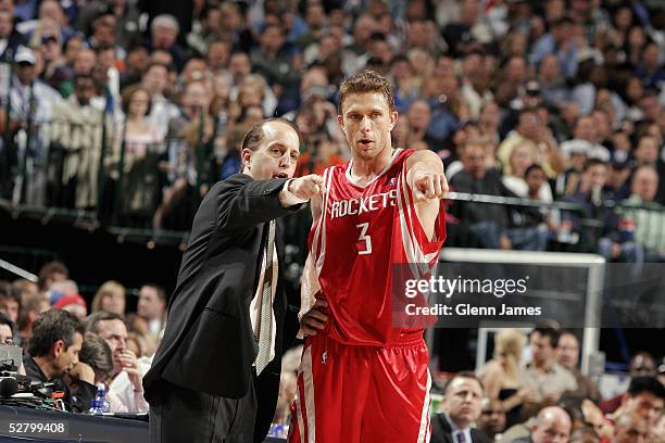 Bob Sura and Head Coach Jeff Van Gundy of the Houston Rockets chat in Game five of the Western Conference Quarterfinals with the Dallas Mavericks...