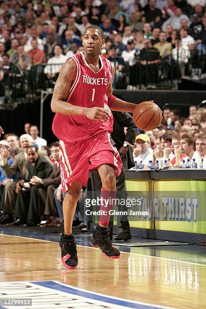Tracy McGrady of the Houston Rockets moves the ball in Game five of the Western Conference Quarterfinals with the Dallas Mavericks during the 2005...