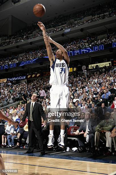 Devin Harris of the Dallas Mavericks takes a jump shot in Game five of the Western Conference Quarterfinals with the Houston Rockets during the 2005...