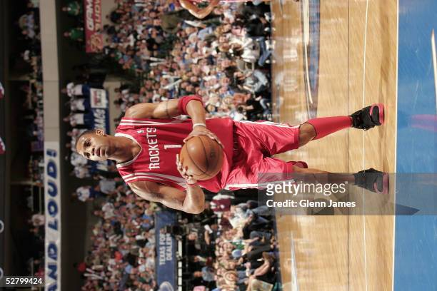 Tracy McGrady of the Houston Rockets shoots a free throw in Game five of the Western Conference Quarterfinals with the Dallas Mavericks during the...