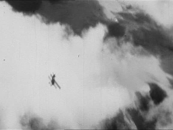 WW1 photo of a biplane in flight, coming out of clouds WW1 photo of a biplane in flight, coming out of clouds