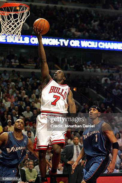 Laron Profit of the Chicago Bulls shoots a layup against Jared Jeffries of the Washington Wizards in Game five of the Eastern Conference...