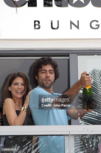 Actors Perrey Reeves and Adrian Grenier attend the unveiling of the Entourage Bungalow at W South Beach on July 23, 2009 in Miami Beach, Florida.