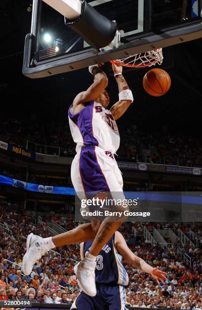 Shawn Marion of the Phoenix Suns completes a slam dunk against the Memphis Grizzlies in Game two of the Western Conference Quarterfinals during the...