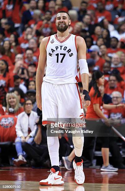 Jonas Valanciunas of the Toronto Raptors smiles in the first half of Game Seven of the Eastern Conference Quarterfinals against the Indiana Pacers...