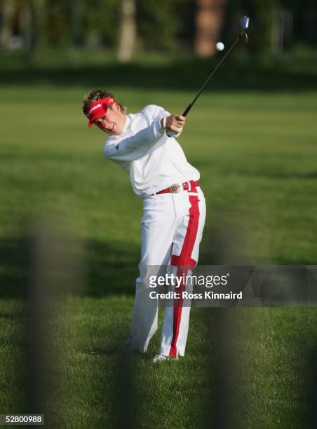 Ian Poulter of England plays his second shot in the par four 10th hole during the first round of the Daily Telegraph Dunlop Masters on the Arden...