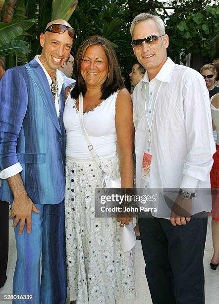 Robert Verdi in Chanel sunglasses, Fern Mallis and Seth McLaughlian, Sunglass Hut Sr. Vice President of Marketing in Ray Ban sunglasses