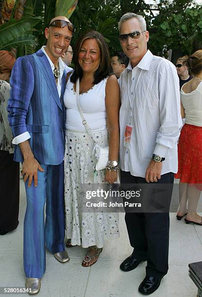 Robert Verdi in Chanel sunglasses, Fern Mallis and Seth McLaughlian, Sunglass Hut Sr. Vice President of Marketing in Ray Ban sunglasses