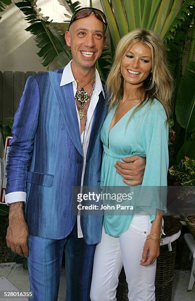 Robert Verdi in Chanel sunglasses with Marisa Miller