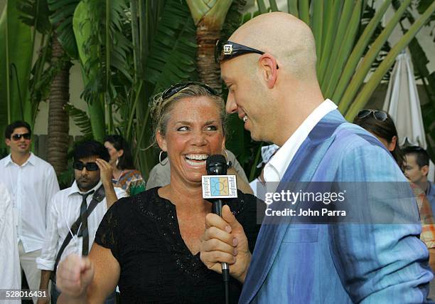 Kathy Drury, Sunglass Hut Vice President of Marketing in Bvlgari sunglasses interviewed by Robert Verdi in Chanel sunglasses