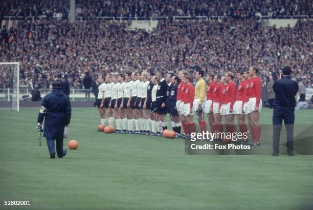 England and Germany line up with match officials before the World Cup Final at Wembley Stadium, 30th July 1966. England went on to win 4-2.