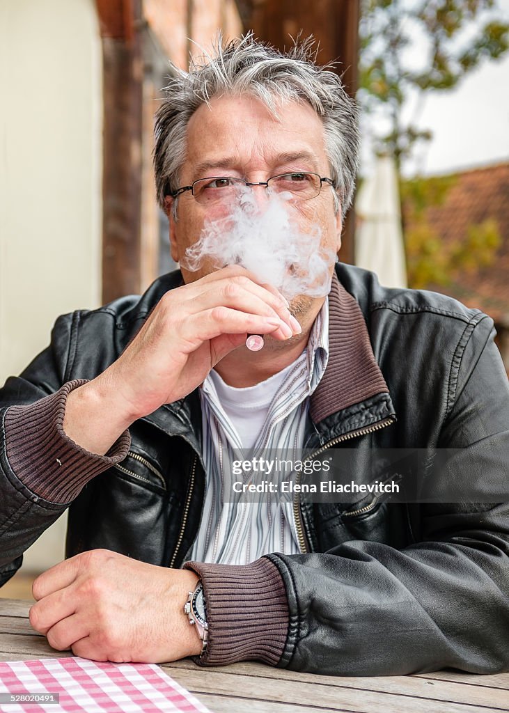 Man smocking E-Cigarette