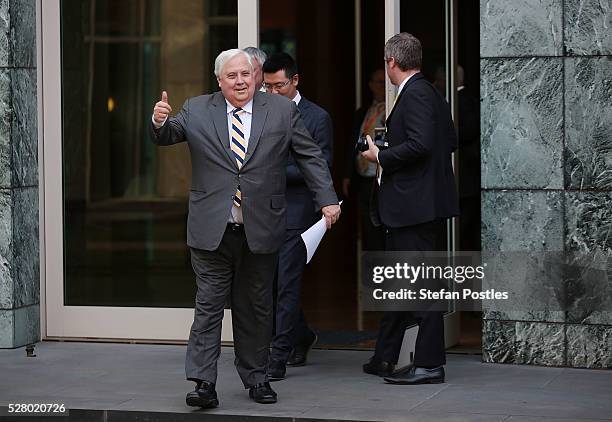 Clive Palmer arrives at a press conference to announce that he will not seek re-election in the House of Representatives at Parliament House on May...