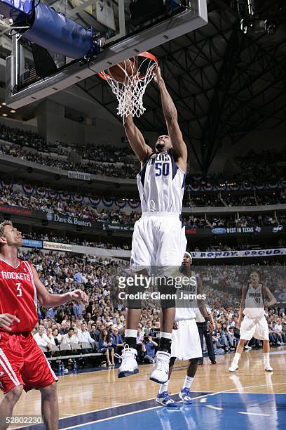 Alan Henderson of the Dallas Mavericks dunks in Game five of the Western Conference Quarterfinals with the Houston Rockets during the 2005 NBA...