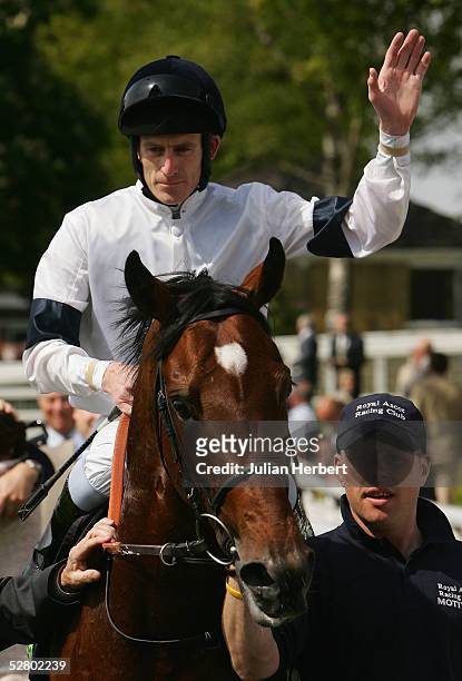 Johnny Murtagh and Motivator return after scoring an easy victory in The Totesport Dante Stakes Race run at York Racecourse on May 12, 2005 in York,...