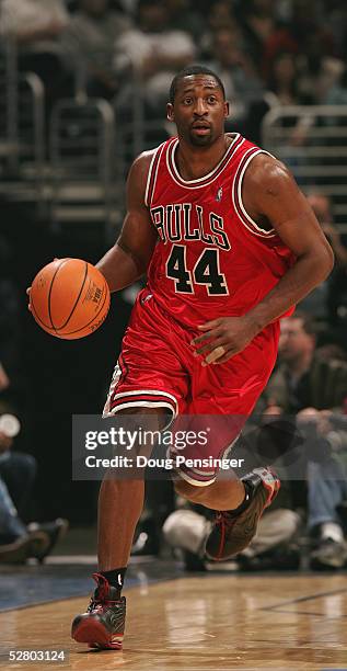 Adrian Griffin of the Chicago Bulls moves the ball in Game four of the Eastern Conference Quarterfinals against the Washington Wizards during 2005...