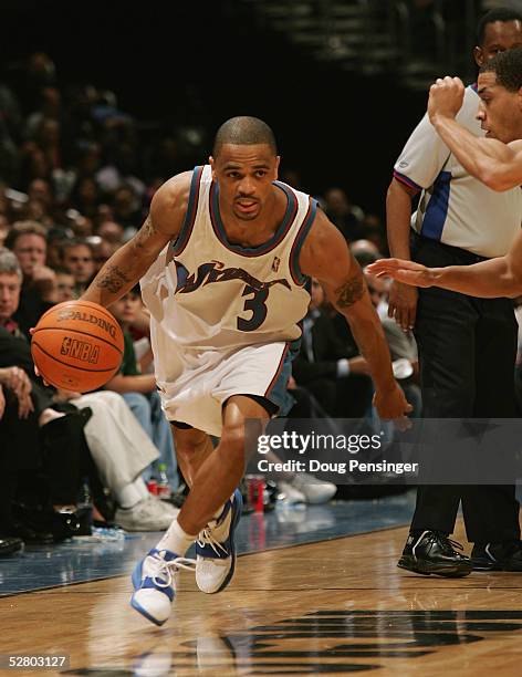 Juan Dixon of the Washington Wizards moves the ball in Game four of the Eastern Conference Quarterfinals against the Chicago Bulls during the 2005...