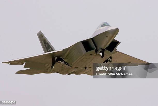 The first F/A-22 Raptor destined for the First Fighter Wing performs a fly-by shortly before being delivered May 12, 2005 at Langley Air Force Base,...