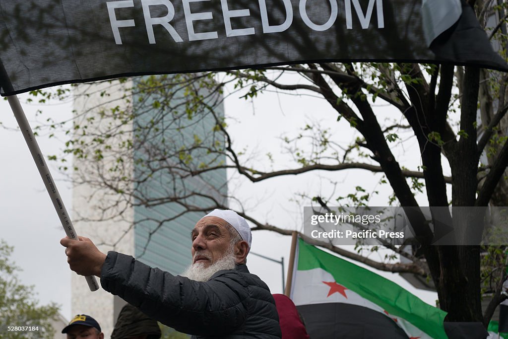 Members of the metro-area Syrian-American community rally...