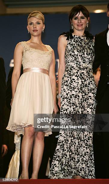 Actors Scarlett Johansson and Emily Mortimer depart the premiere of the film "Match Point" at the Palais during the 58th International Cannes Film...