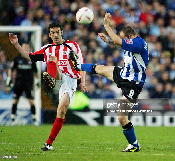 Kevin O'Connor of Brentford battles for the ball with Matt Hamshaw of Sheffield Wednesday during the Coca-Cola Football League Division One Play-Off,...