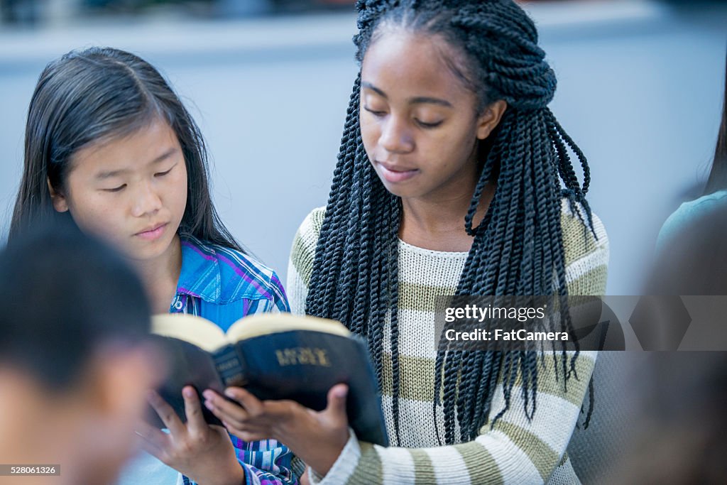 Reading The Bible Together High-Res Stock Photo - Getty Images