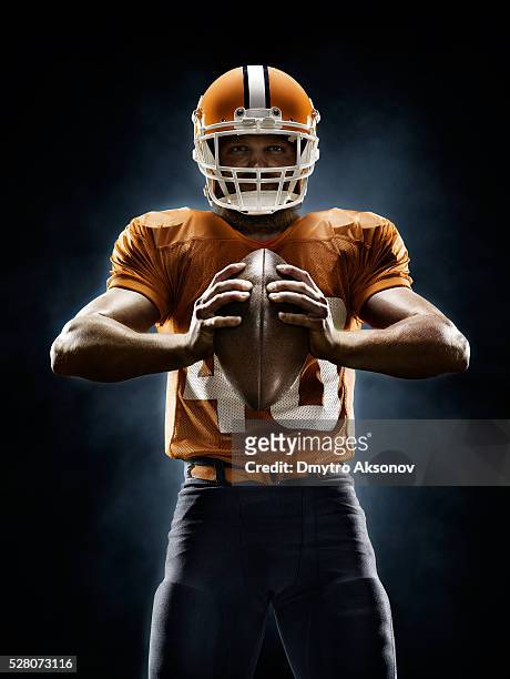 american football player - football player stock pictures, royalty-free photos & images