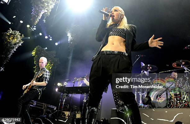 Tom Dumont and Gwen Stefani of No Doubt perform as part of KROQ's Almost Acoustic Christmas 2012 at Gibson Amphitheatre in Universal City, California.