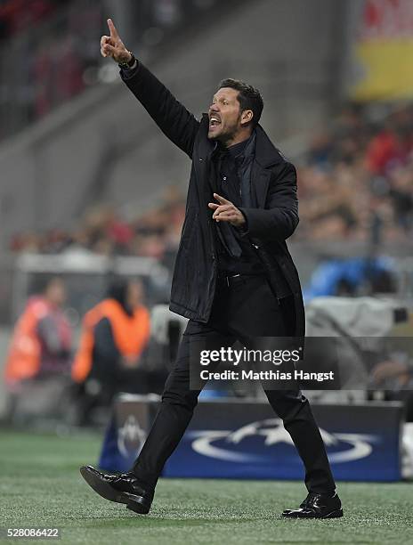 Head coach Diego Simeone of Madrid gestures during the UEFA Champions League semi final second leg match between FC Bayern Muenchen and Club Atletico...