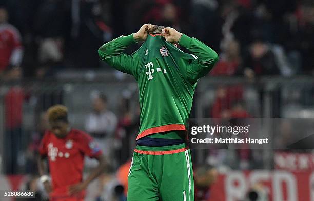 Manuel Neuer of Bayern Munich looks dejected after the UEFA Champions League semi final second leg match between FC Bayern Muenchen and Club Atletico...