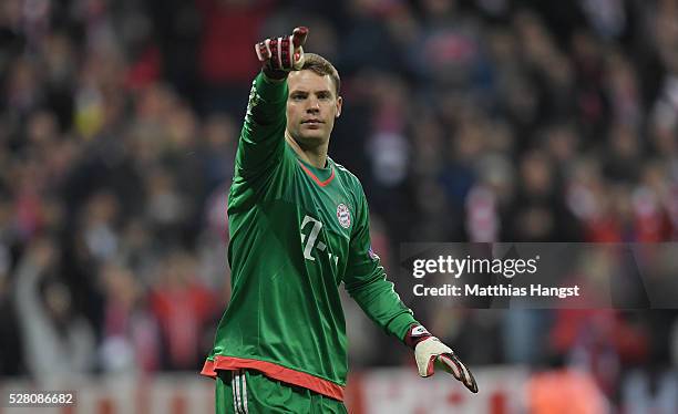 Goalkeeper Manuel Neuer of Muenchen gestures during the UEFA Champions League semi final second leg match between FC Bayern Muenchen and Club...