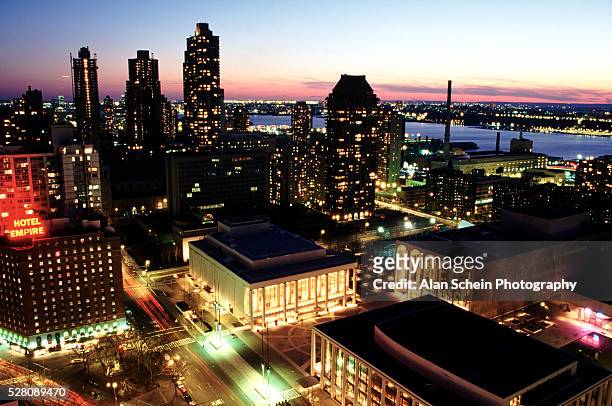 lincoln center in manhattan at sunset - lincoln and center stock pictures, royalty-free photos & images