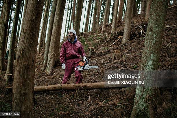 March 4 at Kirikiri, Otsuchi, Iwate, Japan. Yuko Ueyama, 54 years old, kiss her dog before go out walking the dog. The celibacy Yuko named the...