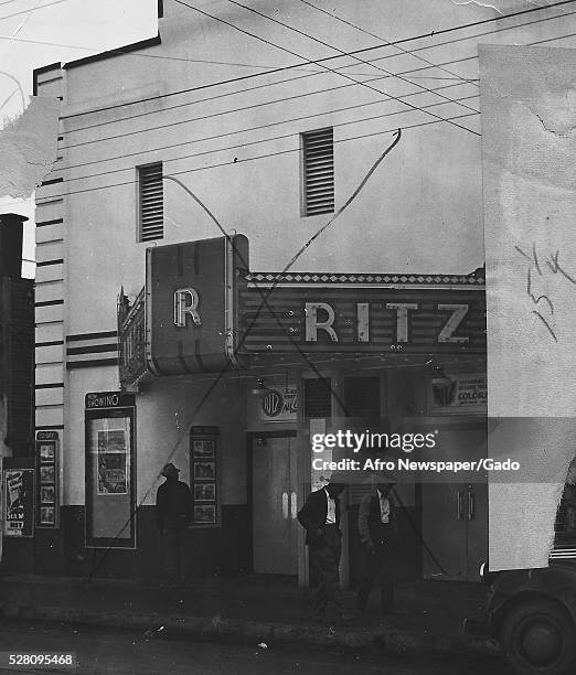 Black and white photograph of the Ritz theater in Louisiana, site of race riots during World War II which started when African-American soldiers from...