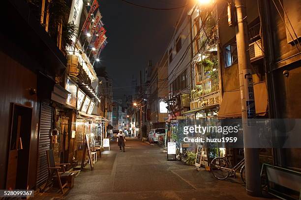 alley of jinbocho - tokyo japan night alley stock pictures, royalty-free photos & images