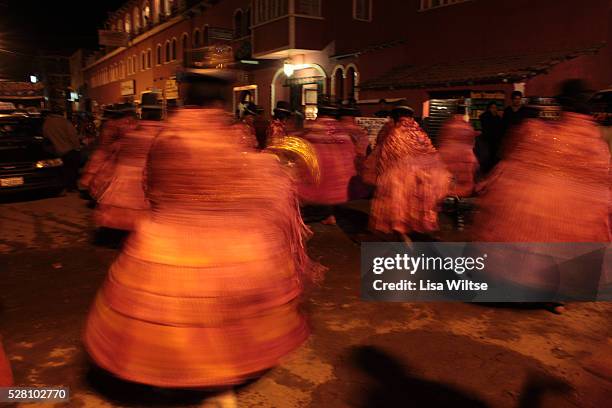 Virgen del la Candelaria Aymaran women dance into the night during the Fiesta de la Virgen de la Candelaria is held to honour the Virgen or the Dark...