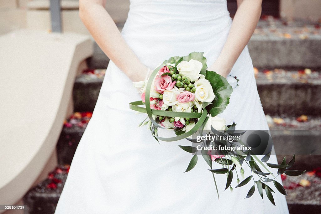 Wedding Bouquet in hands of bride