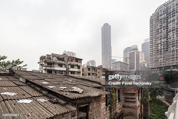 rapid rise of chongqing - old and new - ramshackle building stock pictures, royalty-free photos & images