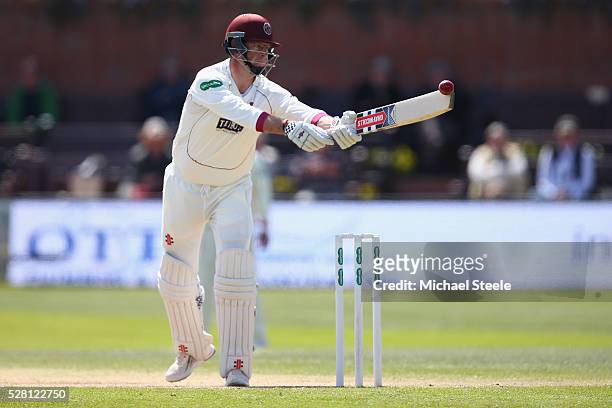 Marcus Trescothick of Somerset prevents the ball dropping onto his stumps during day four of the Specsavers County Championship Division One match...