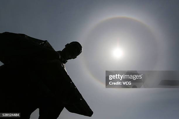 Image shows solar halo appears in the sky on May 4, 2016 in Huangshan, Anhui Province of China. A halo is an optical phenomenon produced by light...