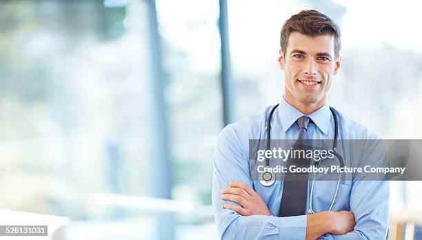 count on me for all your health needs - handsome doctors stock pictures, royalty-free photos & images