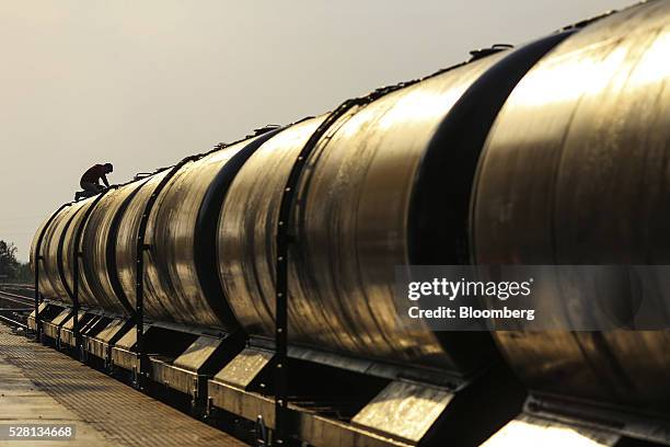 Train pulling water tankers stands at Latur railway station in Latur, Maharashtra, India, on Saturday, April 16, 2016. Hundreds of millions of people...